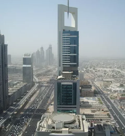 how far is Abu Dhabi from Dubai