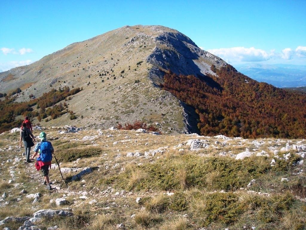 Hikers on a mountain trail in Pollino National Park near Mormanno, Calabria